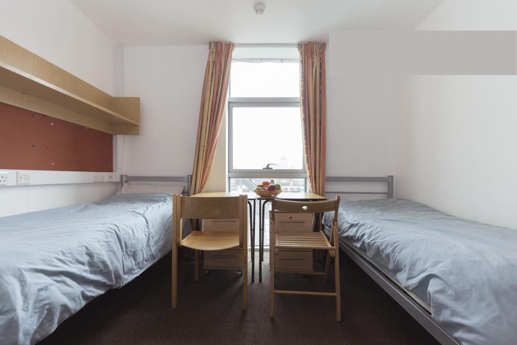 Single Bed in Female Dormitory Room